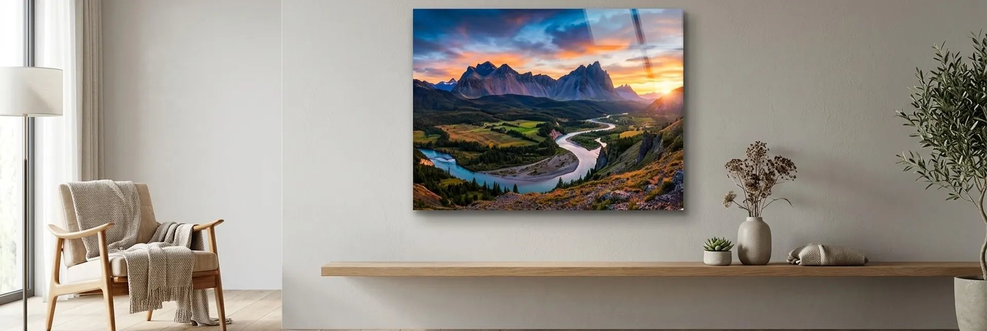 Mountain valley sunset with a winding river on a glossy acrylic print above a living-room bench