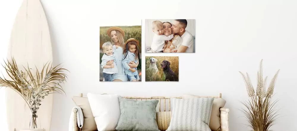 printed posters arranged on a wall