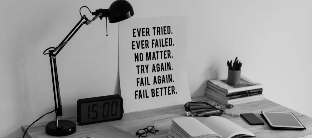 stylish printed poster above a desk