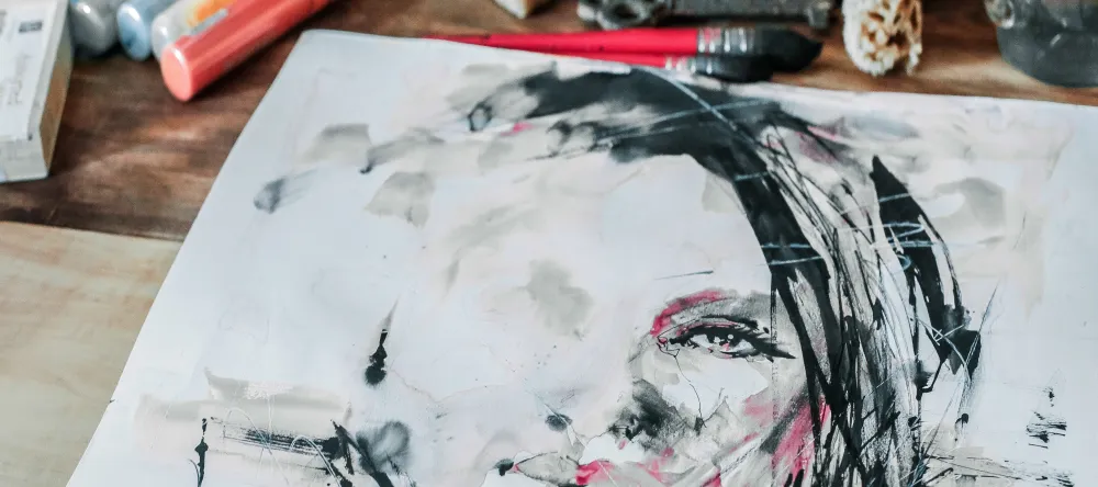 What are canvas paintings. Painting of a woman's face on canvas.