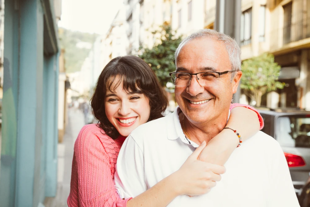 Father and daughter embracing in a tender moment, illustrating a strong papa daughter bond