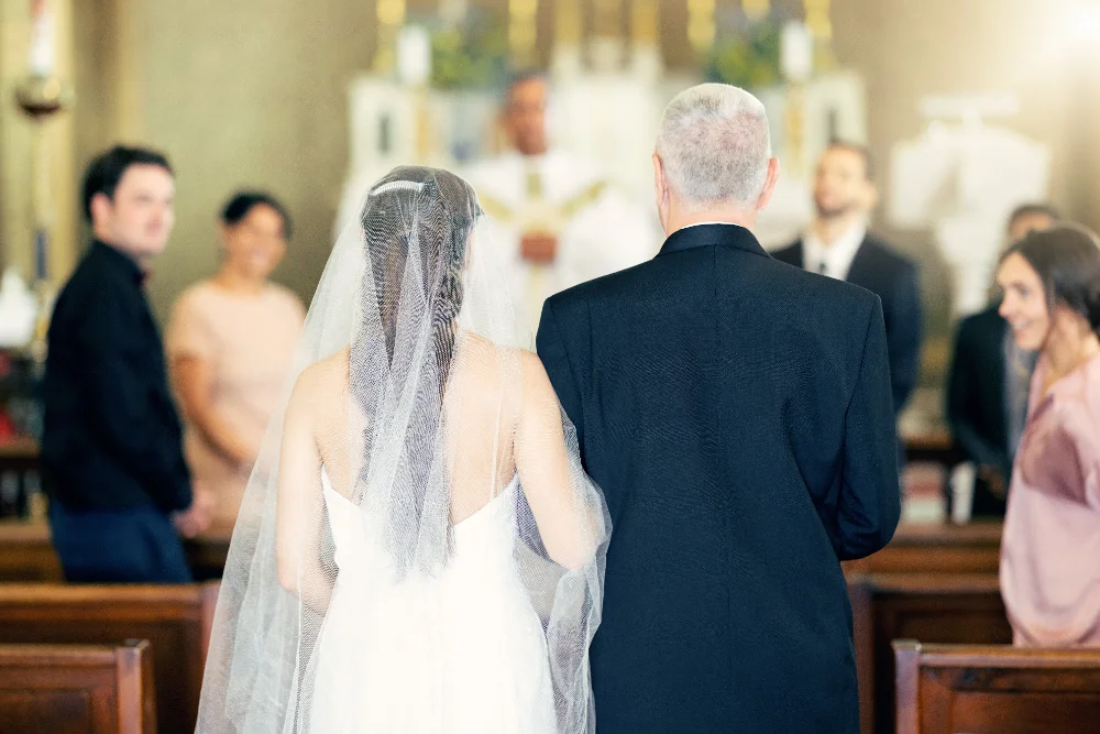 Father and daughter dancing at a wedding, illustrating daddy daughter dance quotes