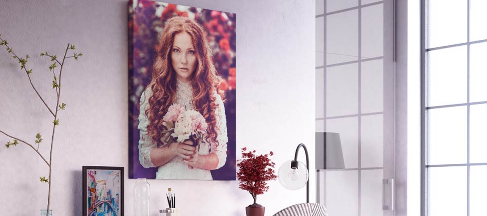 The Pros & Cons of Canvas Printing. Photo canvas print showing young lady with flowers.