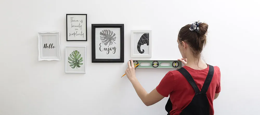 How to Hang Pictures Without Nails. Hammer and Nails.