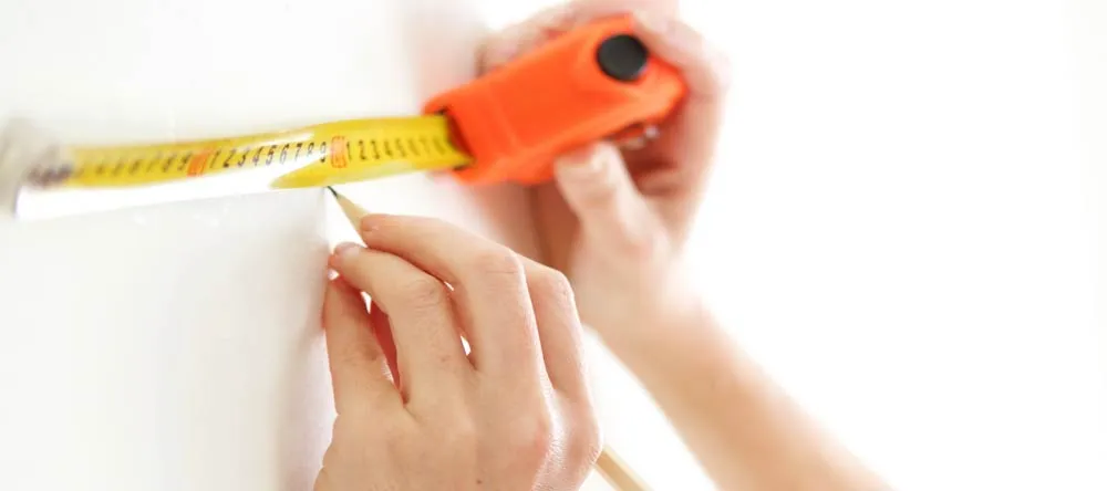 How to Hang Pictures Without Nails. Adhesive Tape.