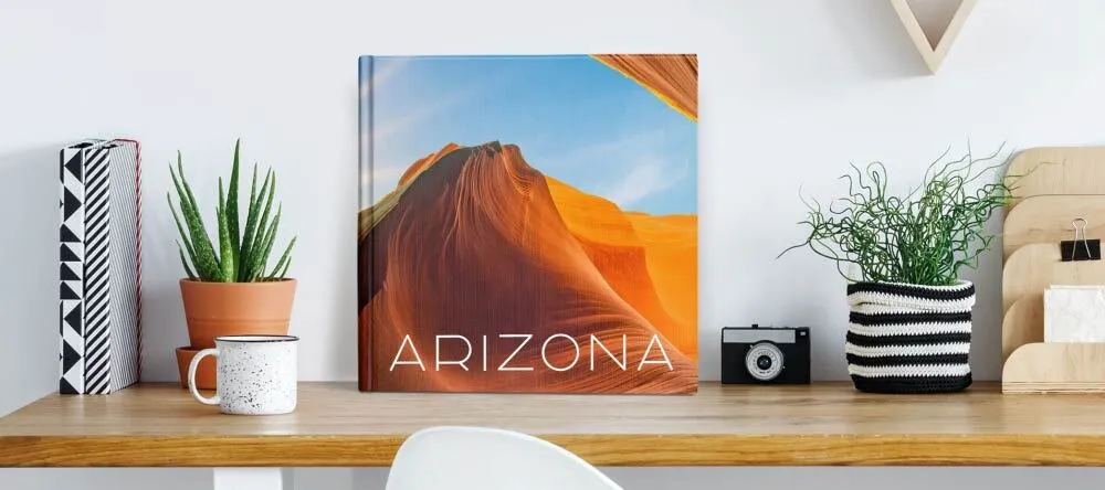 How To Make a Photo Book Online. Custom photo book displayed on a desk. 