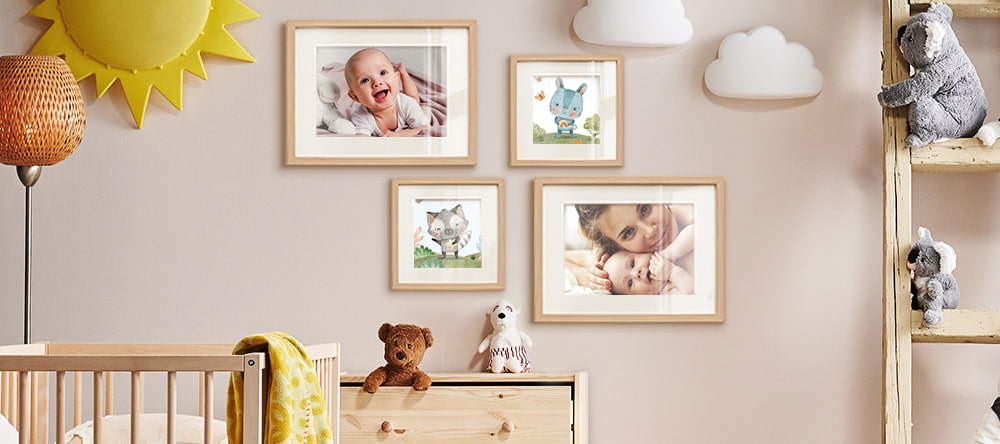 Wall Art for Nursery: four framed photos with baby photos on the wall