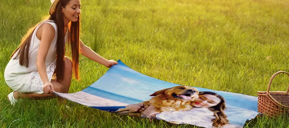 Who Makes the Best Photo Blankets? Personalized blanket used as a picnic blanket.