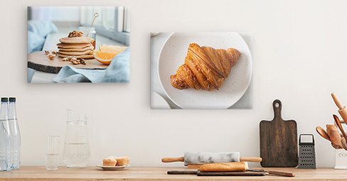 Canvas prints for the kitchen: a canvas print on the wall between two kitchen shelves