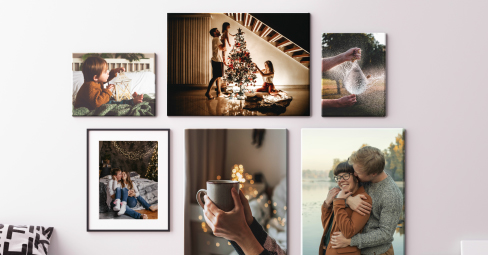 Christmas canvas prints. Christmas canvas prints on wall with Christmas tree next to them.