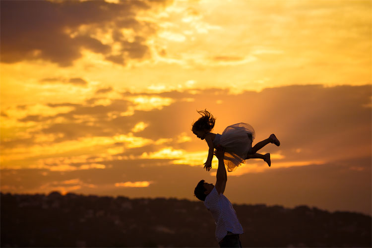 Father and daughter embracing in a tender moment, illustrating a strong papa daughter bond
