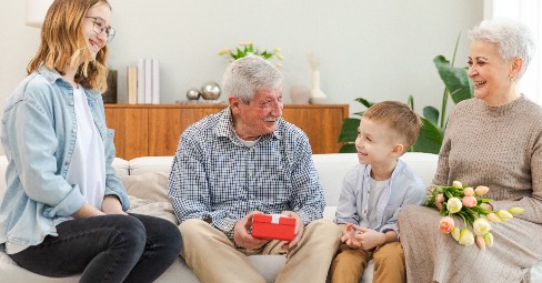 Grandparents opening a personalized photo gift
