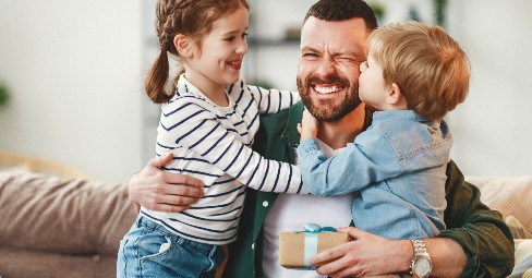 Personalized gifts for dad on a wooden table