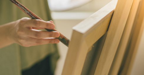 What are canvas paintings. Painting of a woman's face on canvas.