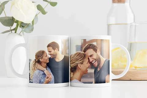 two mugs with matching photos of a couple
