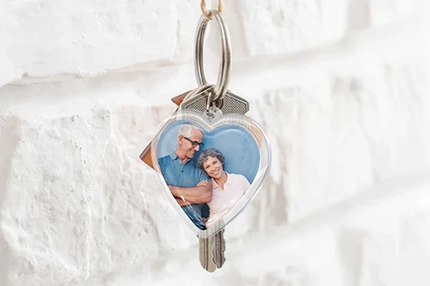 heart shaped keychain with mother and son